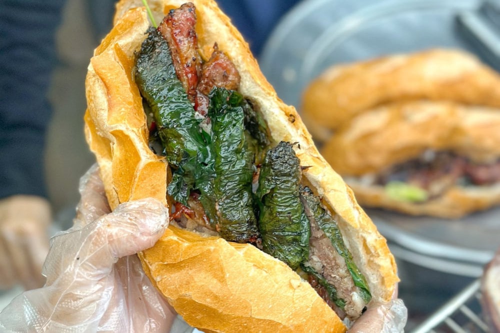 In addition to grilled pork banh mi, Banh Mi Ba Huong also offers grilled beef wrapped in piper lolot banh mi